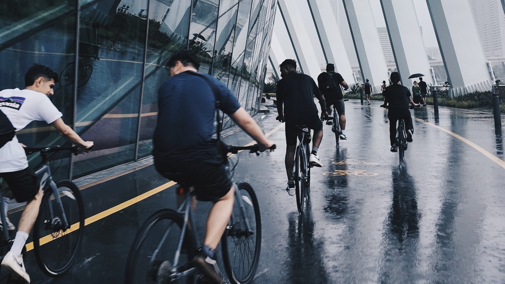 Bicycle rental at Pasir Ris Town Park by Momentum Cycle, people enjoying cycling in Singapore’s scenic park